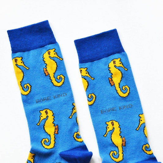 Blue bamboo socks with animated seahorses, supporting Save the Seahorses initiative
