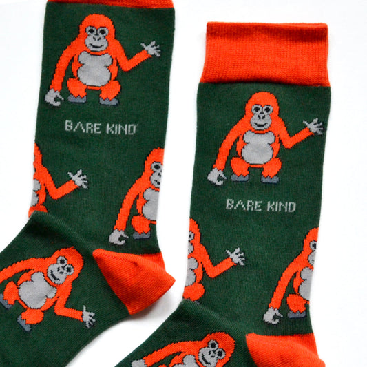 cuff closeup flat lay of dark green bamboo orangutan socks