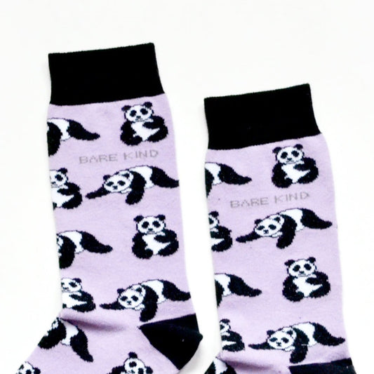 cuff closeup flat lay of lilac and black panda socks