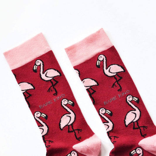 cuff closeup flat lay of hot pink flamingo socks