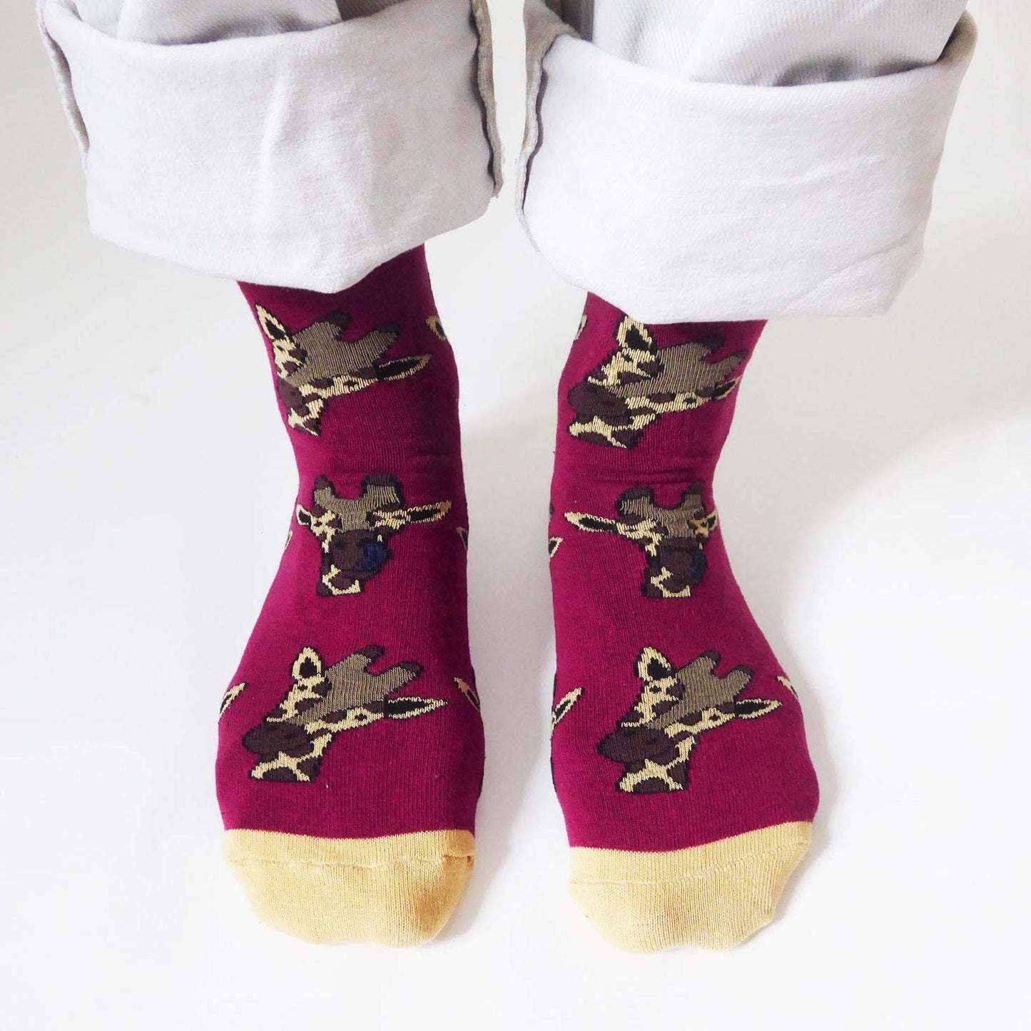 Three pairs of colorful bamboo socks featuring purple elephant, blue hippo, and red giraffe from the Mega Animals Bundle