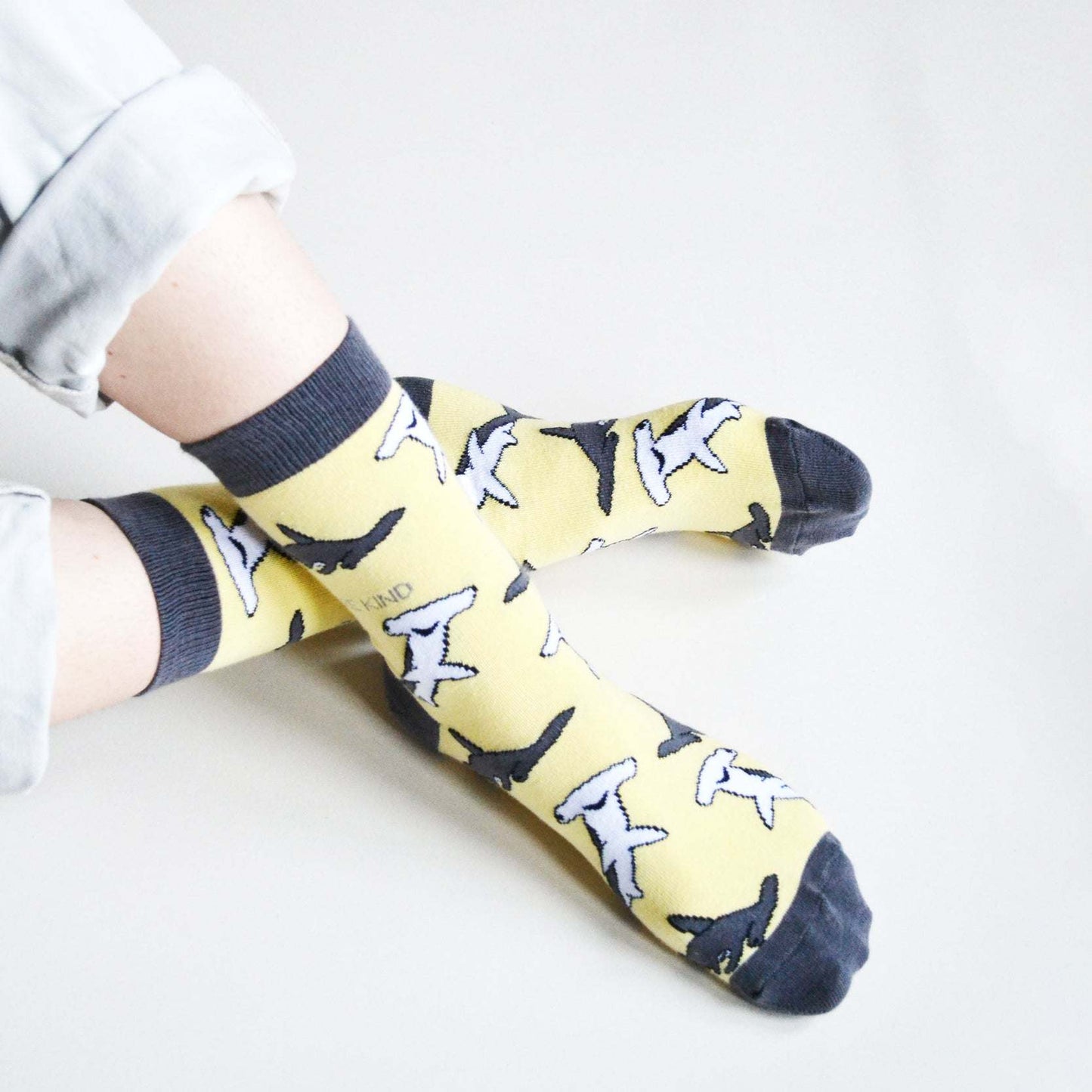 Yellow bamboo Save the Sharks socks with animated shark designs, eco-friendly and comfortable
