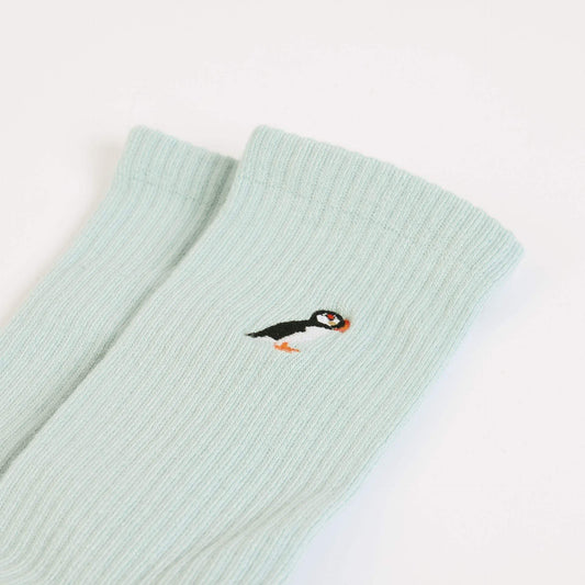 flat lays of blue puffin ribbed bamboo socks