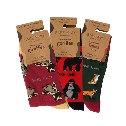 packaging flat lays of red Giraffe, Gorilla & Fox