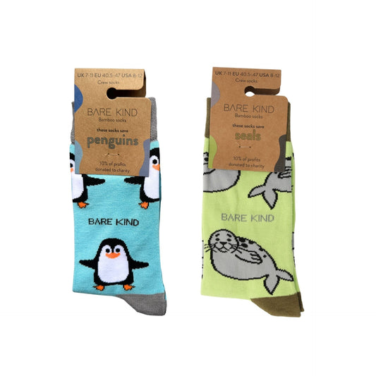 Two pairs of soft bamboo socks featuring blue penguin and green seal designs from the Bamboo Socks Duo