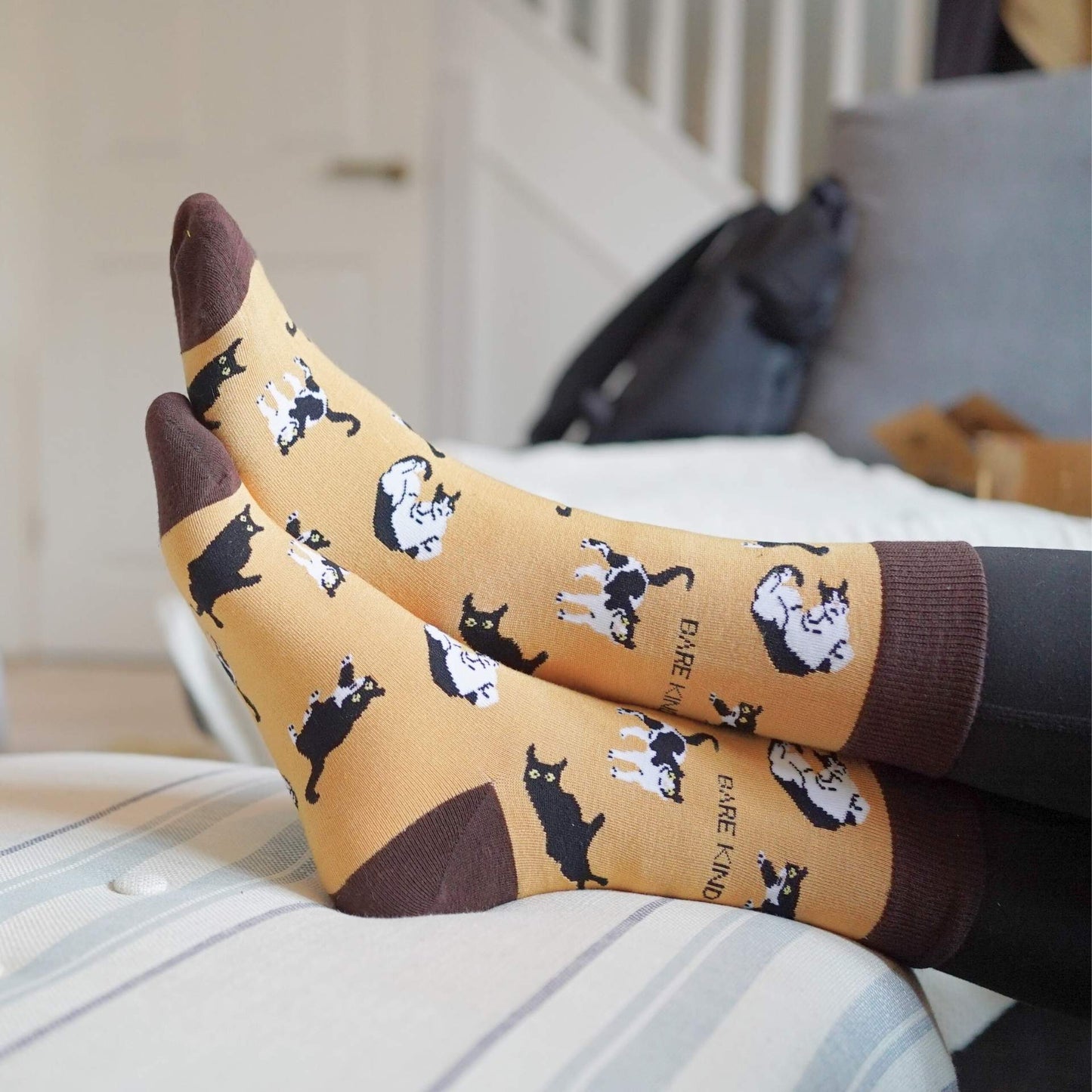 model wearing brown cat bamboo socks