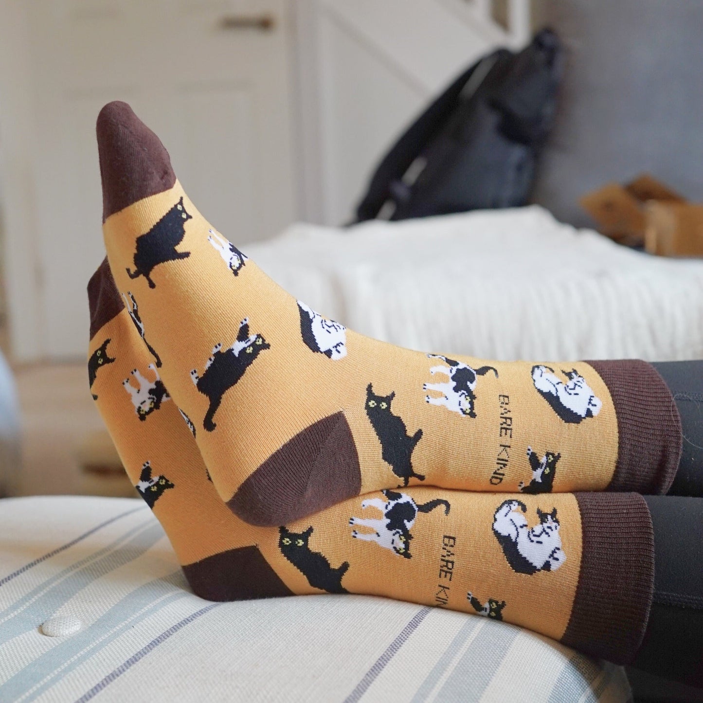 model wearing brown cat bamboo socks