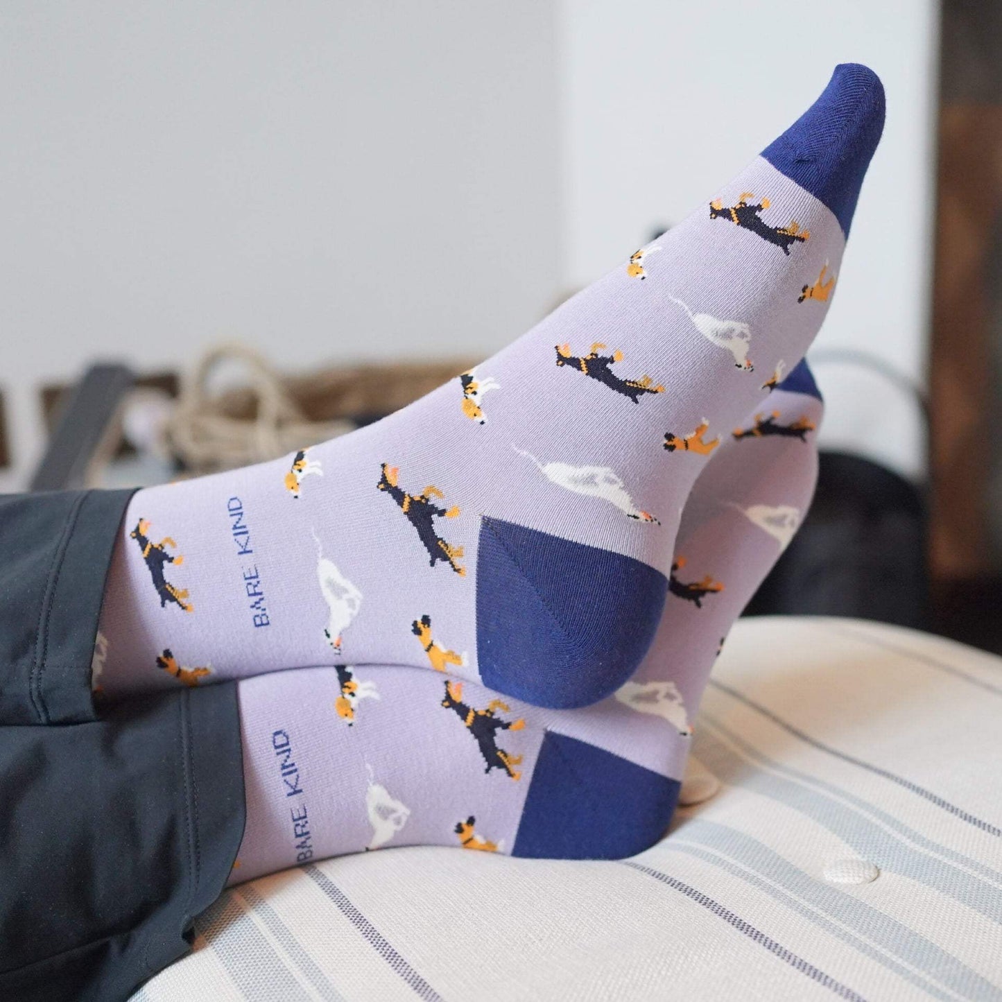 model wearing purple dog bamboo socks