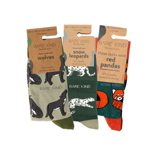 Snowy Mountain 3 Pack bamboo socks featuring wolf, snow leopard, and red panda designs for cozy winter wear and wildlife conservation