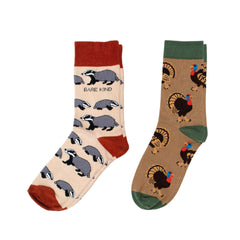 Two pairs of socks with animal patterns on a white background