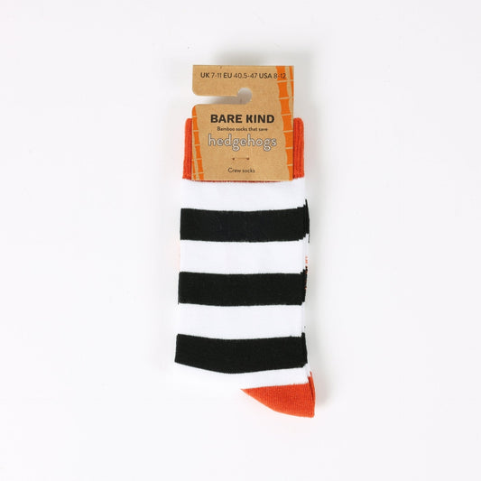 Black and white striped socks with orange accents on a white background, featuring 'Bare Kind' packaging.