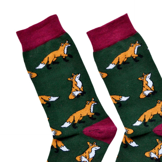 toe closeup flat lay of dark green and maroon fox socks