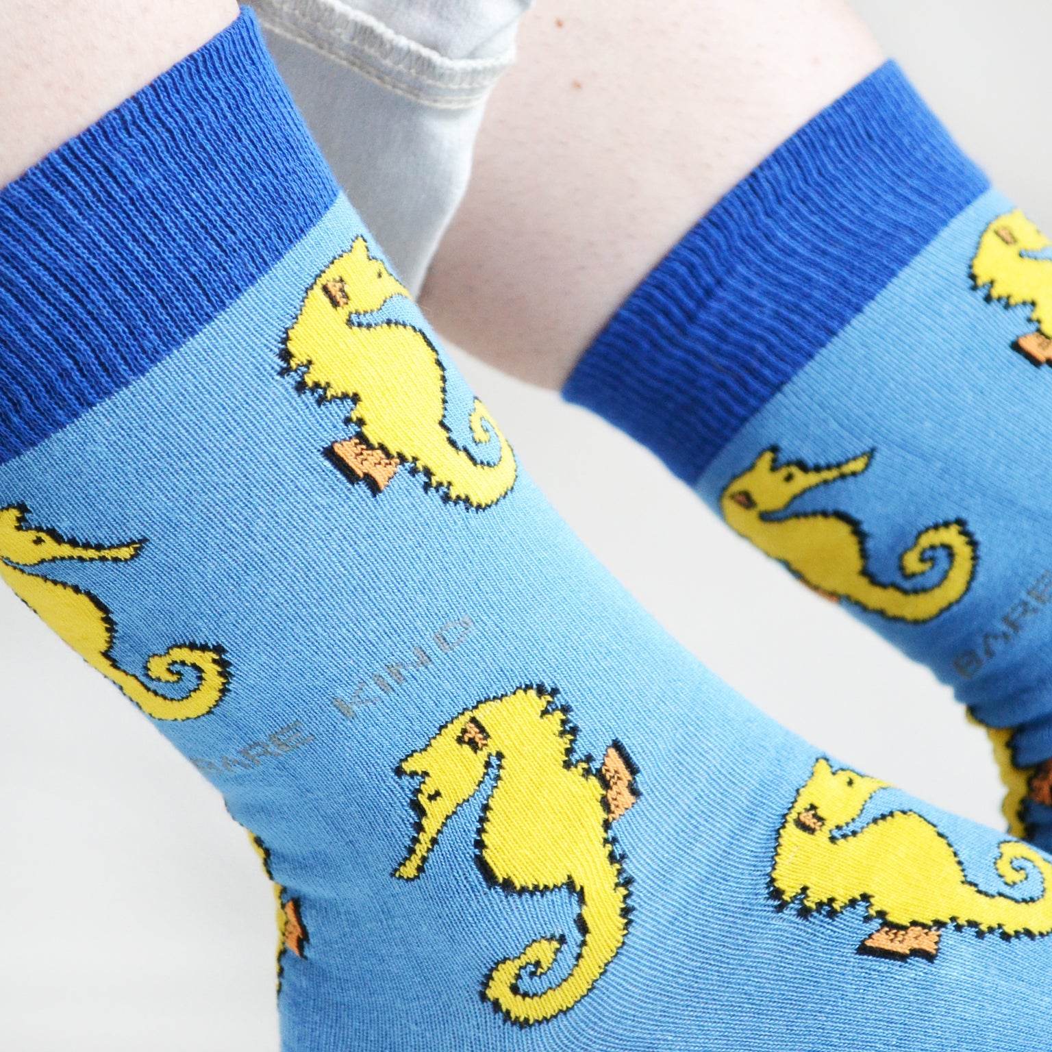 Blue bamboo socks with animated seahorses, supporting Save the Seahorses campaign