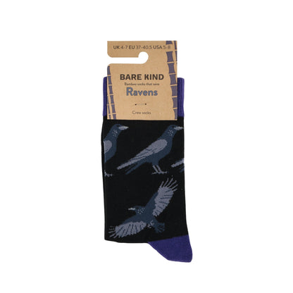 Black socks with raven design and 'Bare Kind' packaging on a white background