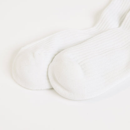 flat lays of white sloth ribbed bamboo socks