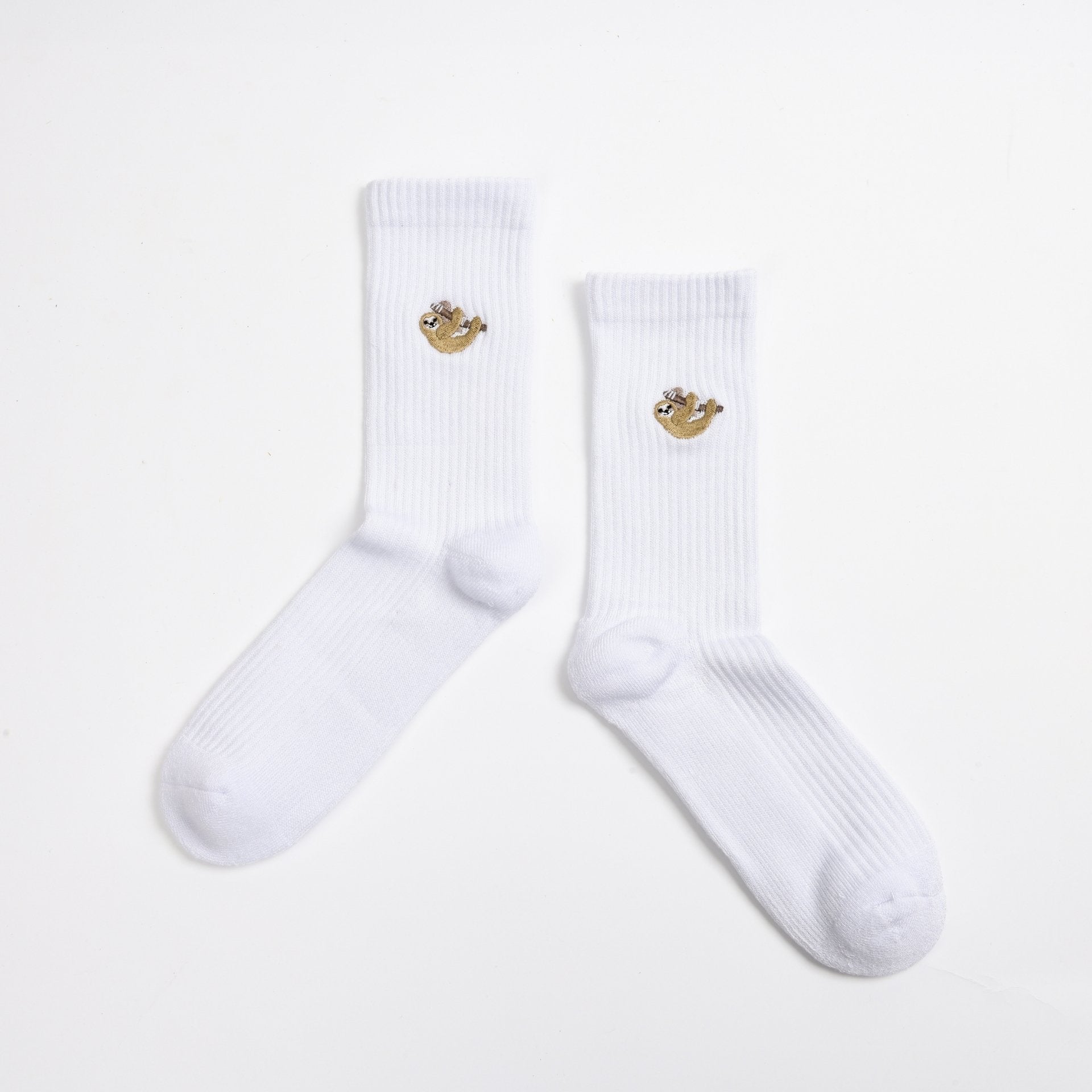 flat lays of white sloth ribbed bamboo socks