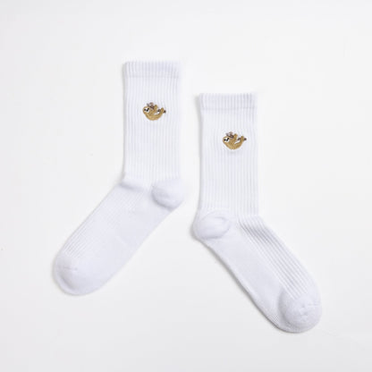 flat lays of white sloth ribbed bamboo socks