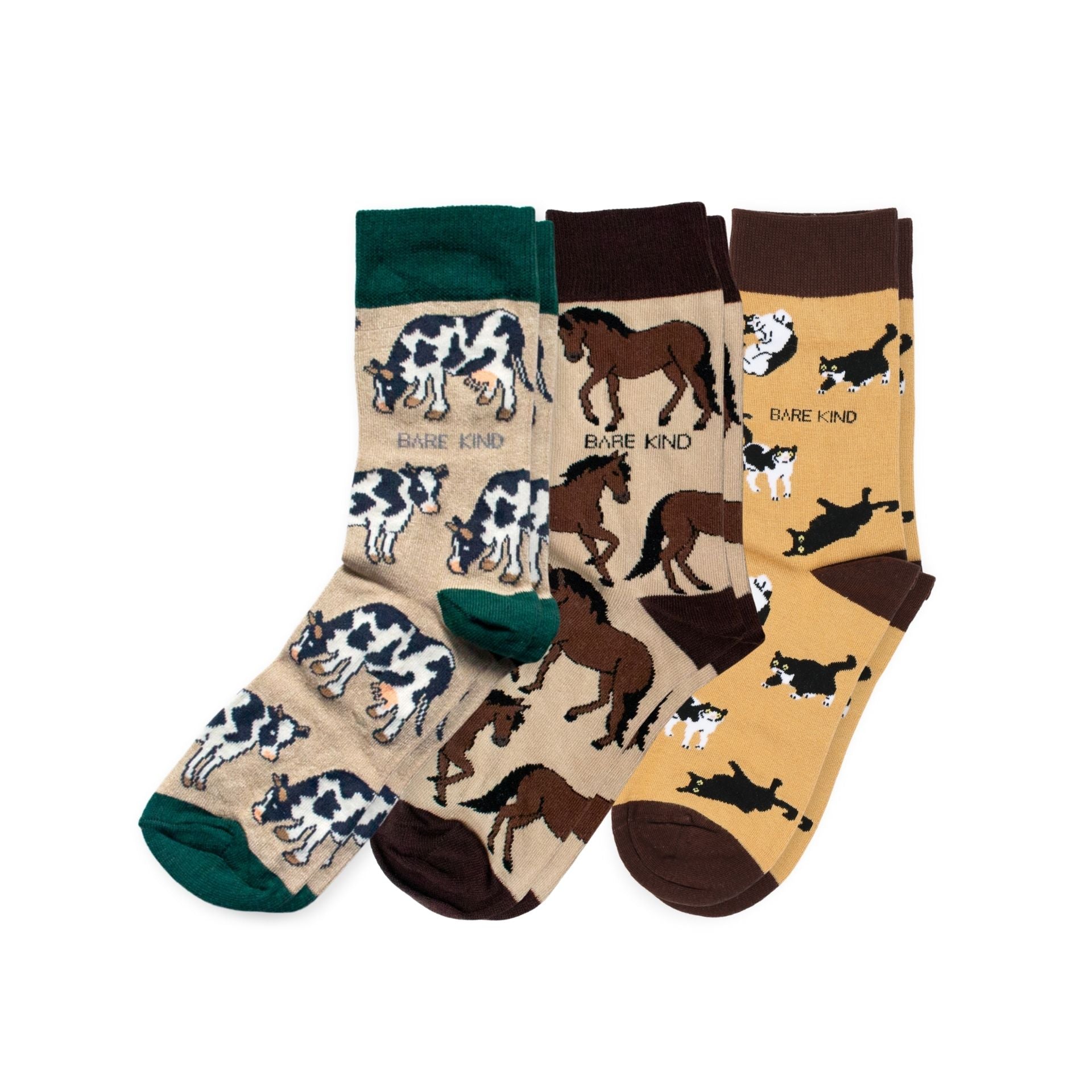 Three pairs of socks with animal patterns on a white background