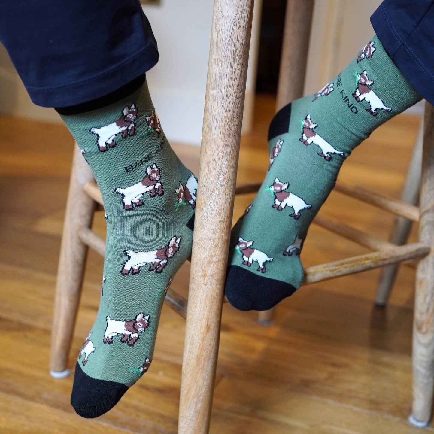 model wearing green goats bamboo socks