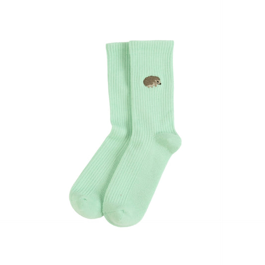 flat lays of green hedgehogs ribbed bamboo socks